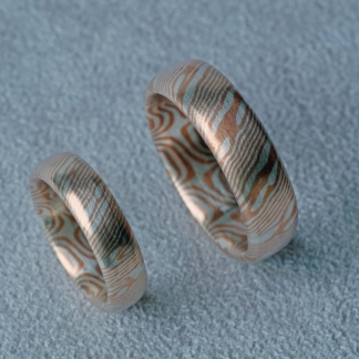 Mokume Gane Eheringe mit 8 Sterne innen aus 925/- Silber und Shibuichi